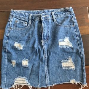 Distressed denim skirt